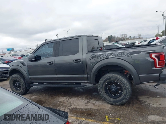 2020 Ford F-150 Raptor with VIN 1FTFW1RG0LFB66566, listed as a IAAI auction lot 41306076 with 92,596 mi miles and . Bid and sale history available at carsss.com. Image 14.