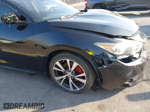 2016 Nissan Maxima SL z VIN 1N4AA6AP1GC383512, wystawiony jako IAAI lot #41490666 z przebiegiem 110 235 mil mil oraz . Historia ofert i sprzedaży dostępna na DreamBid. Obrazek 18.