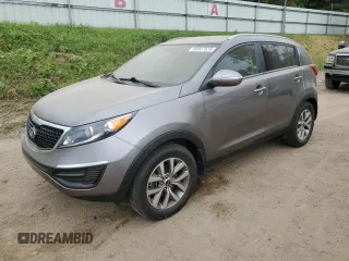 2015 Kia Sportage LX z VIN KNDPB3AC1F7697956, wystawiony jako Copart lot #60927535 z przebiegiem 102 312 mil mil oraz Czysty tytuł • Clean title. Historia ofert i sprzedaży dostępna na DreamBid. Obrazek 1.