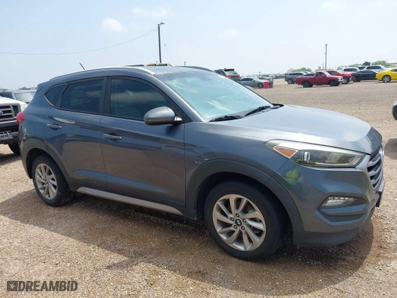 2017 Hyundai Tucson SE Plus with VIN KM8J33A42HU375273, listed as a IAAI auction lot 41900474 with 124,658 mi miles. Bid and sale history available at carsss.com. Image 13.
