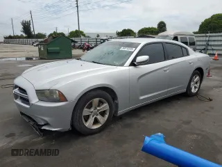 2012 Dodge Charger SE with VIN 2C3CDXBG4CH203207, listed as a Copart auction lot 56910395 with 156,016 mi miles and Salvage Title. Bid and sale history available at DreamBid. Image 1.