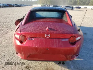2023 Mazda MX-5 Miata Grand Touring with VIN JM1NDAM71P0559428, listed as a Copart auction lot 76596984 with 7,237 mi miles and Salvage title. Bid and sale history available at DreamBid. Image 6.