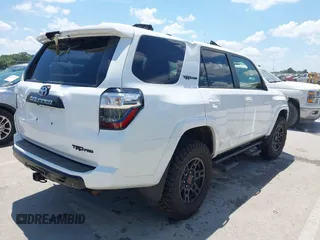 2018 Toyota 4Runner SR5 with VIN JTEBU5JRXJ5595186, listed as a IAAI auction lot 42607713 with 83,592 mi miles and . Bid and sale history available at DreamBid. Image 4.