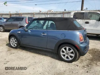 2010 MINI Convertible S with VIN WMWMS3C5XATY51076, listed as a Copart auction lot 48532735 with 104,901 mi miles and Clean title. Bid and sale history available at DreamBid. Image 2.