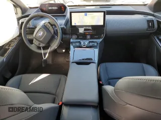 2023 Subaru Solterra Premium с VIN JTMABABA6PA023006, выставлен на аукционе Copart как лот 47940774 с пробегом 1 014 миль миль и . История ставок и продаж доступна на DreamBid. Изображение 8.