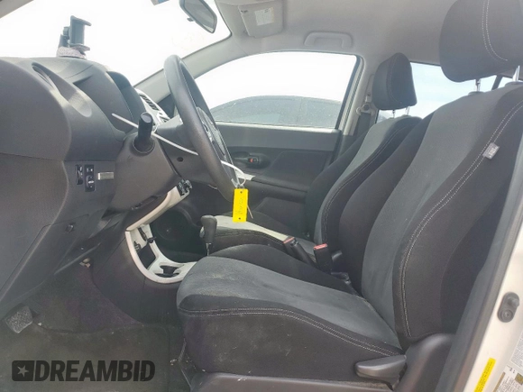 2012 Scion xD with VIN JTKKU4B46C1017963, listed as a Copart auction lot 49777595 with 118,606 mi miles and Salvage Title. Bid and sale history available at DreamBid. Image 7.