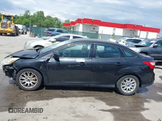 2012 Ford Focus SE with VIN 1FAHP3F24CL107411, listed as a IAAI auction lot 42177334 with 89,242 mi miles and . Bid and sale history available at DreamBid. Image 15.