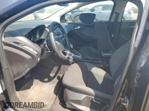 2013 Ford Focus SE with VIN 1FADP3F20DL242367, listed as a Copart auction lot 61382545 with 67,720 mi miles and Clean title. Bid and sale history available at DreamBid. Image 7.