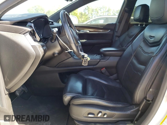 2017 Cadillac XT5 Platinum AWD with VIN 1GYKNFRS6HZ252130, listed as a Copart auction lot 52923025 with 58,046 mi miles and Salvage Title. Bid and sale history available at carsss.com. Image 7.