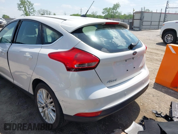 2016 Ford Focus Titanium with VIN 1FADP3N28GL222941, listed as a IAAI auction lot 42050881 with 97,001 mi miles and . Bid and sale history available at DreamBid. Image 3.