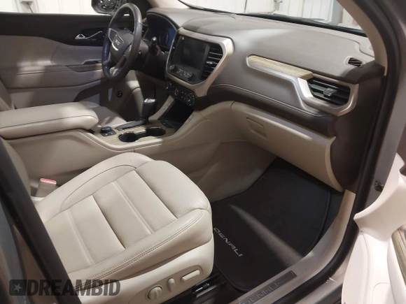 2019 GMC Acadia Denali with VIN 1GKKNXLS6KZ142226, listed as a IAAI auction lot 40453039 with 21,770 mi miles and . Bid and sale history available at carsss.com. Image 5.