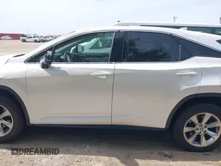 2019 Lexus RX 350 z VIN 2T2ZZMCA4KC126214, wystawiony jako IAAI lot #41881877 z przebiegiem 91 419 mil mil oraz . Historia ofert i sprzedaży dostępna na DreamBid. Obrazek 14.