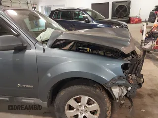 2010 Ford Escape Hybrid with VIN 1FMCU4K31AKC15842, listed as a IAAI auction lot 41332030 with 490,296 mi miles and . Bid and sale history available at DreamBid. Image 15.