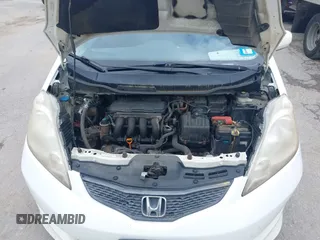 2011 Honda Fit Sport z VIN JHMGE8H51BC016707, wystawiony jako IAAI lot #42341893 z przebiegiem 326 759 mil mil oraz . Historia ofert i sprzedaży dostępna na DreamBid. Obrazek 10.