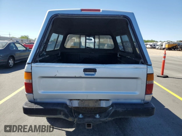 1991 Toyota Pickup z VIN JT4RN13PXM6031833, wystawiony jako Copart lot #58953095 z przebiegiem 252 237 mil mil oraz Czysty tytuł • Clean title. Historia ofert i sprzedaży dostępna na DreamBid. Obrazek 6.