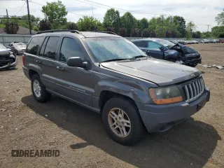 2004 Jeep Grand Cherokee Laredo with VIN 1J4GW48S64C291404, listed as a Copart auction lot 62835335 with 170,365 mi miles and Salvage title. Bid and sale history available at DreamBid. Image 4.