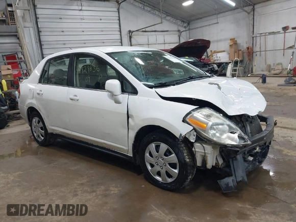2009 Nissan Versa 1.8 S with VIN 3N1BC11E19L382848, listed as a IAAI auction lot 41929836 with 185,990 mi miles. Bid and sale history available at carsss.com. Image 1.