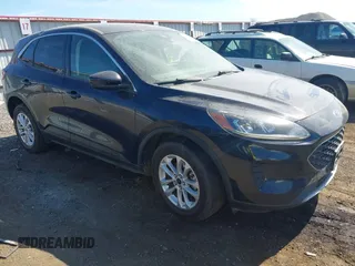 2021 Ford Escape SE z VIN 1FMCU9G67MUA51313, wystawiony jako IAAI lot #42629994 z przebiegiem 149 885 mil mil oraz . Historia ofert i sprzedaży dostępna na DreamBid. Obrazek 1.