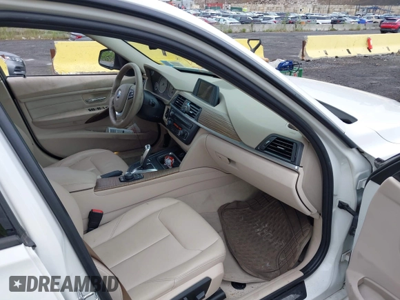 2012 BMW 3 Series 328i с VIN WBA3A5C57CF341151, выставлен на аукционе IAAI как лот 42259279 с пробегом 70 035 миль миль и . История ставок и продаж доступна на DreamBid. Изображение 5.
