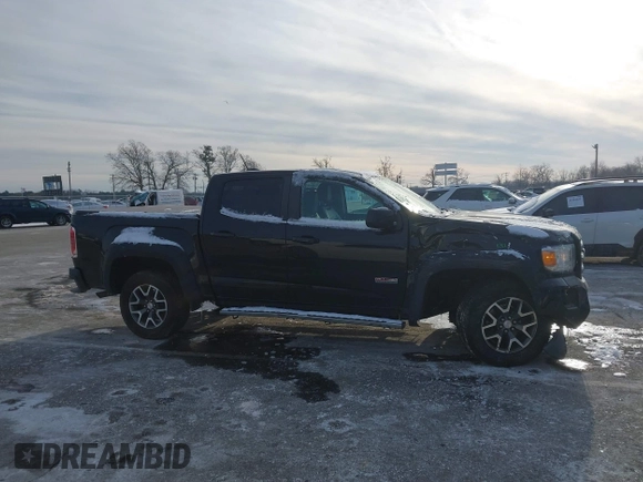 2015 GMC Canyon 4WD SLE z VIN 1GTG6BE31F1270675, wystawiony jako IAAI lot #41407183 z przebiegiem 143 117 mil mil oraz . Historia ofert i sprzedaży dostępna na DreamBid. Obrazek 13.