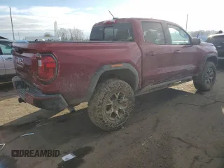 2024 GMC Canyon 4WD AT4X with VIN 1GTP6EEK9R1153150, listed as a Copart auction lot 82867754 with 2,140 mi miles and Salvage Title. Bid and sale history available at carsss.com. Image 3.