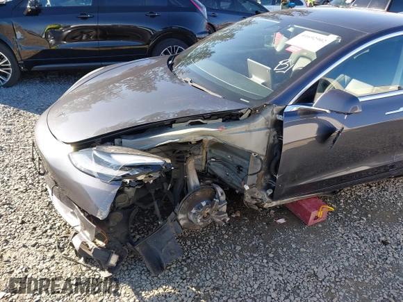 2020 Tesla Model 3 Long Range with VIN 5YJ3E1EB6LF647510, listed as a IAAI auction lot 41692902 with 69,736 mi miles. Bid and sale history available at carsss.com. Image 6.