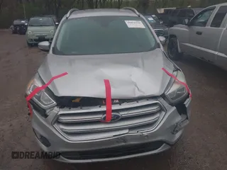 2017 Ford Escape Titanium with VIN 1FMCU0J96HUC21987, listed as a IAAI auction lot 41971376 with 97,488 mi miles and . Bid and sale history available at DreamBid. Image 6.