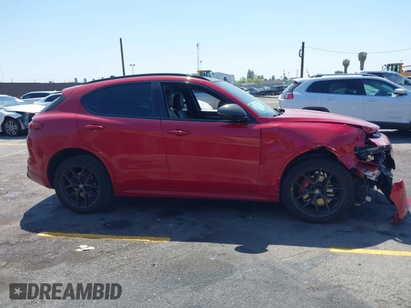 2020 Alfa Romeo Stelvio Ti z VIN ZASPAKBN5L7C73874, wystawiony jako IAAI lot #41996616 z przebiegiem Nie podano mil oraz . Historia ofert i sprzedaży dostępna na DreamBid. Obrazek 13.