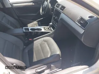 2013 Volkswagen Passat SE with VIN 1VWBN7A31DC056185, listed as a IAAI auction lot 42466848 with 95,484 mi miles and . Bid and sale history available at DreamBid. Image 5.