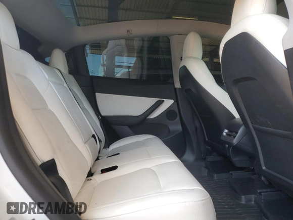 2021 Tesla Model Y Performance z VIN 5YJYGDEF5MF215870, wystawiony jako Copart lot #52531015 z przebiegiem 21 904 mil mil oraz Szkoda całkowita • Salvage title. Historia ofert i sprzedaży dostępna na DreamBid. Obrazek 10.