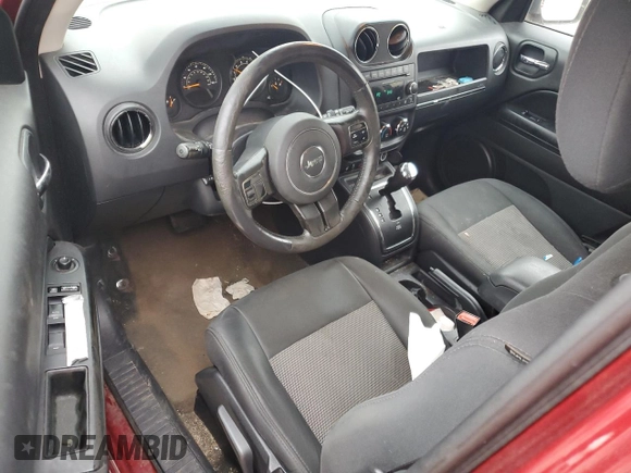 2014 Jeep Patriot Latitude with VIN 1C4NJPFA8ED818233, listed as a Copart auction lot 43947895 with 142,474 mi miles and Salvage Title. Bid and sale history available at carsss.com. Image 8.