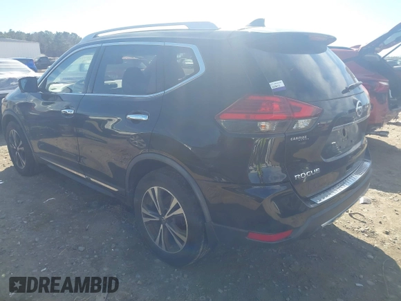 2017 Nissan Rogue S with VIN JN8AT2MV2HW013018, listed as a IAAI auction lot 41693946 with 128,667 mi miles and . Bid and sale history available at DreamBid. Image 3.