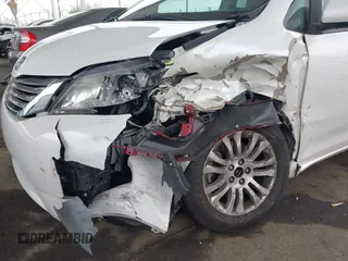 2015 Toyota Sienna XLE with VIN 5TDYK3DC5FS640102, listed as a IAAI auction lot 41885194 with 119,972 mi miles. Bid and sale history available at carsss.com. Image 6.