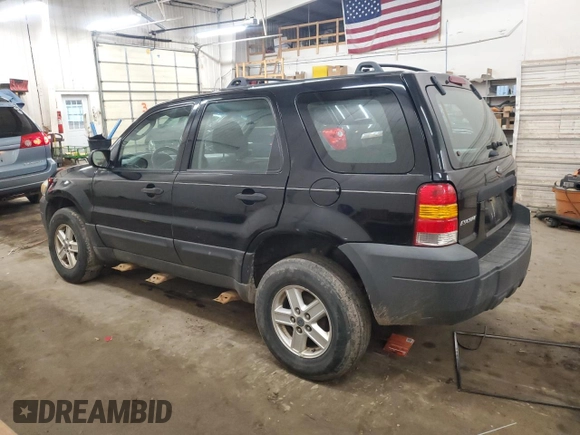 2005 Ford Escape XLS Value with VIN 1FMYU92Z05DA10448, listed as a Copart auction lot 54438955 with 185,303 mi miles and Salvage title. Bid and sale history available at DreamBid. Image 2.