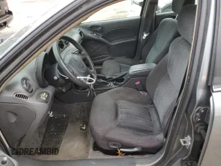 2004 Pontiac Grand Am SE1 with VIN 1G2NF52E34C226097, listed as a Copart auction lot 87185994 with 138,563 mi miles and Clean Title. Bid and sale history available at carsss.com. Image 7.