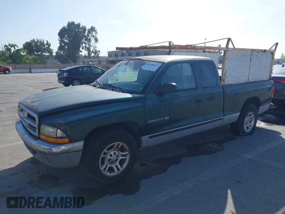 2000 Dodge Dakota with VIN 1B7GL22X2YS648337, listed as a IAAI auction lot 42100658 with 180,790 mi miles. Bid and sale history available at carsss.com. Image 2.