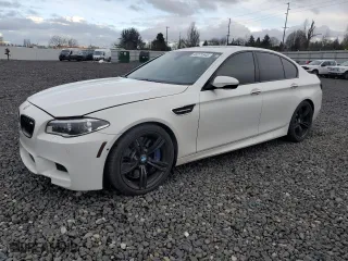 2015 BMW M5 with VIN WBSFV9C58FD594984, listed as a Copart auction lot 46271545 with 71,483 mi miles and Salvage Title. Bid and sale history available at carsss.com. Image 1.