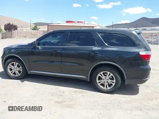 2012 Dodge Durango SXT with VIN 1C4RDJAG0CC206726, listed as a IAAI auction lot 42653653 with 243,337 mi miles and . Bid and sale history available at DreamBid. Image 14.