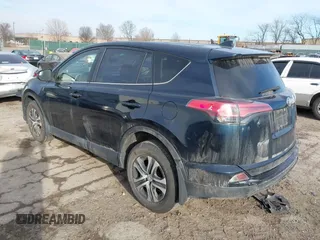 2018 Toyota RAV4 LE with VIN JTMBFREV5JD253342, listed as a IAAI auction lot 41656581 with 243,791 mi miles and . Bid and sale history available at DreamBid. Image 3.