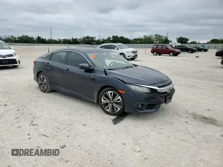 2016 Honda Civic EX-L z VIN 19XFC1F7XGE017790, wystawiony jako Copart lot #53608425 z przebiegiem 119 715 mil mil oraz Szkoda całkowita • Salvage title. Historia ofert i sprzedaży dostępna na DreamBid. Obrazek 10.