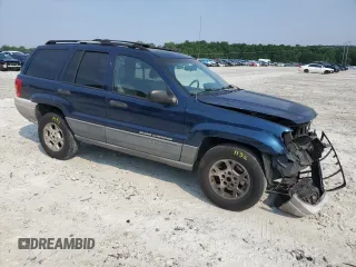 2001 Jeep Grand Cherokee Laredo with VIN 1J4GX48S11C729366, listed as a Copart auction lot 62524565 with 373,749 mi miles and Salvage title. Bid and sale history available at DreamBid. Image 4.
