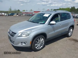 2011 Volkswagen Tiguan SE with VIN WVGBV7AX4BW532488, listed as a IAAI auction lot 42084347 with 107,529 mi miles and . Bid and sale history available at DreamBid. Image 2.