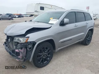 2019 Jeep Grand Cherokee Laredo E with VIN 1C4RJFAG9KC670974, listed as a IAAI auction lot 42333028 with 163,958 mi miles and . Bid and sale history available at DreamBid. Image 18.