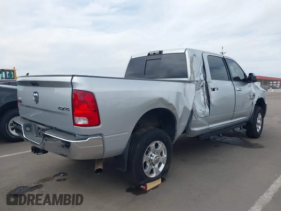 2016 Ram 2500 SLT with VIN 3C6UR5MJ7GG248640, listed as a IAAI auction lot 41776817 with 111,604 mi miles and . Bid and sale history available at DreamBid. Image 4.