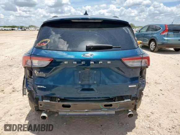 2020 Ford Escape SEL with VIN 1FMCU0H61LUA31969, listed as a Copart auction lot 62408675 with 53,220 mi miles and Salvage title. Bid and sale history available at DreamBid. Image 6.