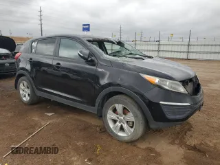 2013 Kia Sportage LX z VIN KNDPBCA25D7450010, wystawiony jako Copart lot #54597815 z przebiegiem 110 980 mil mil oraz Czysty tytuł • Clean title. Historia ofert i sprzedaży dostępna na DreamBid. Obrazek 4.
