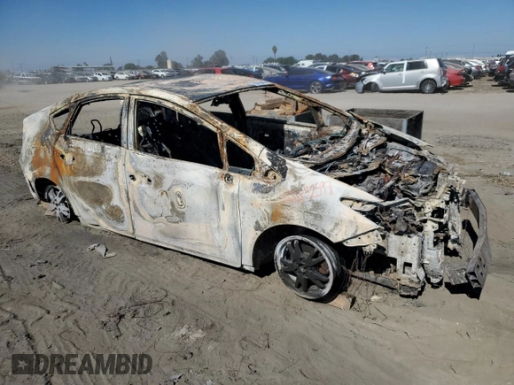 2015 Toyota Prius Four с VIN JTDKN3DU0F1939614, выставлен на аукционе Copart как лот 63700445 с пробегом Не указан миль и На запчасти • Non repairable. История ставок и продаж доступна на DreamBid. Изображение 4.