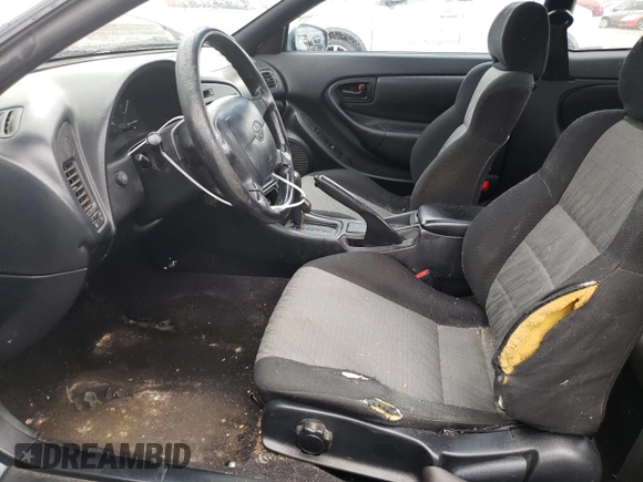 1995 Toyota Celica ST with VIN JT2AT00N7S0047304, listed as a Copart auction lot 77003784 with 423,438 mi miles and Salvage Title. Bid and sale history available at carsss.com. Image 7.