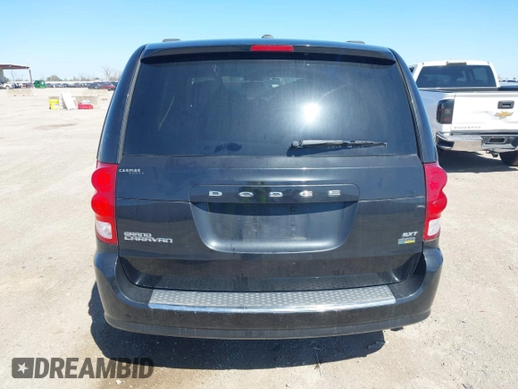 2016 Dodge Grand Caravan SXT with VIN 2C4RDGCG0GR387856, listed as a IAAI auction lot 41769163 with 103,856 mi miles and . Bid and sale history available at DreamBid. Image 17.