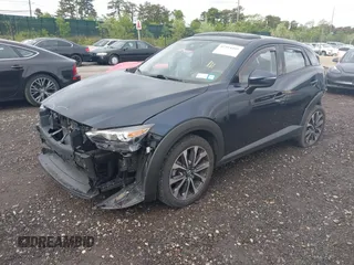 2019 Mazda CX-3 Touring z VIN JM1DKFC76K0446440, wystawiony jako IAAI lot #42314401 z przebiegiem 57 901 mil mil oraz . Historia ofert i sprzedaży dostępna na DreamBid. Obrazek 2.